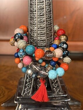 Multi-Strand Colorful Beaded Bracelet with Red Tassel